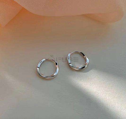 Hypoallergenic Silver Twisted Oval Huggie Hoop Earrings